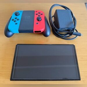 Nintendo Switch Console OLED with Red and Blue Controllers